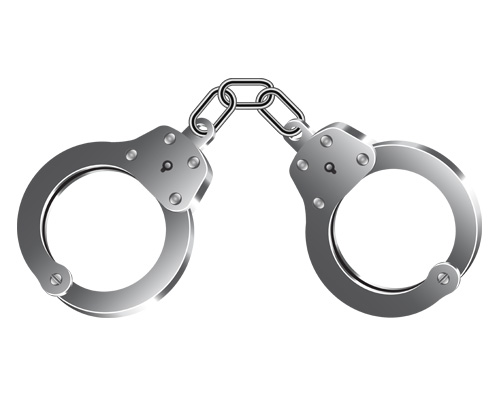 Handcuffs are used by a policeman